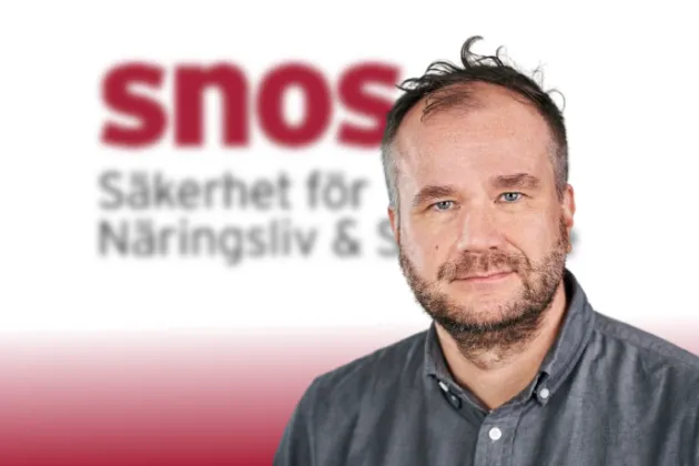 Markus Lahtinen inklippt framför SNOS logotyp. 